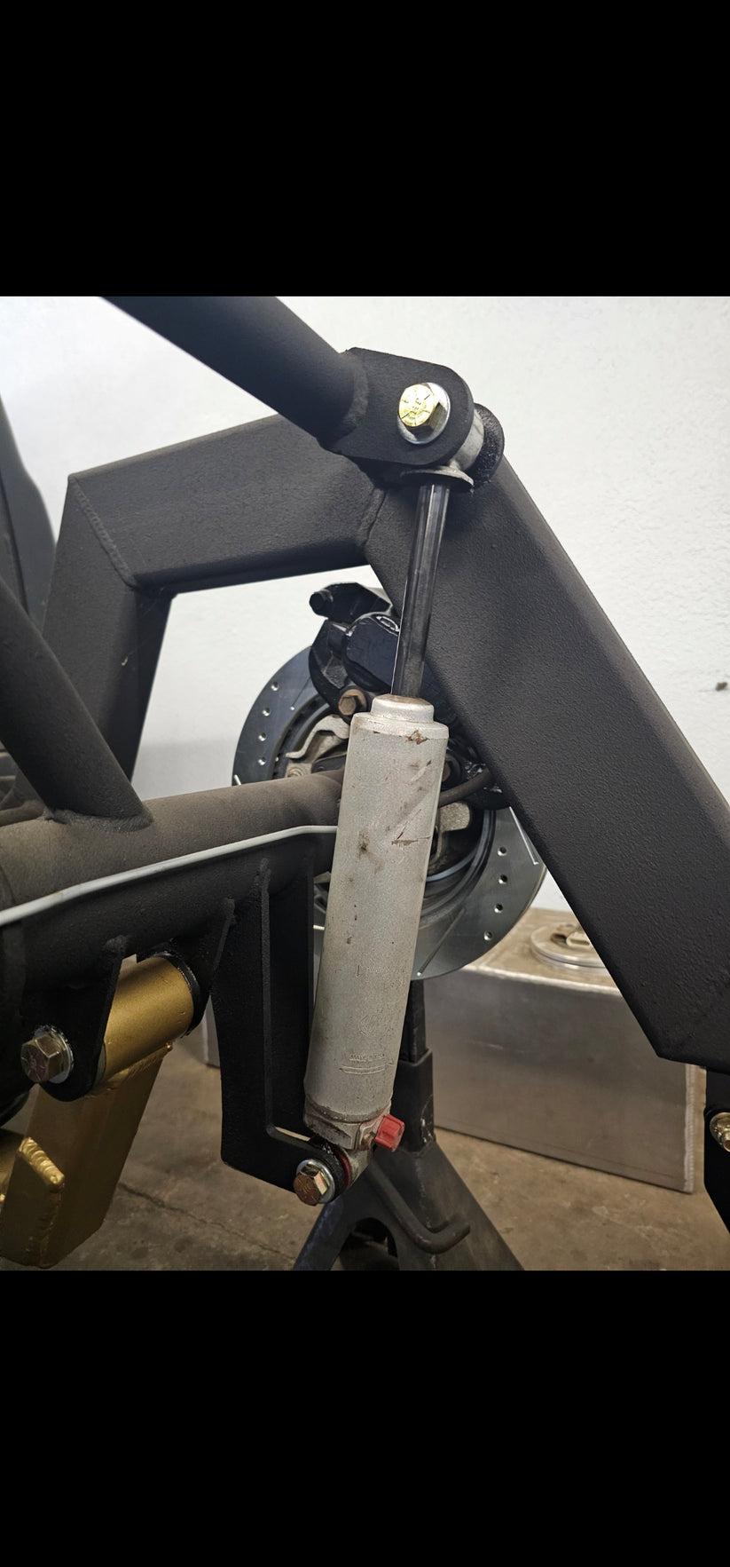 Universal Shock Relocation Tabs – Kaotic Metalworks